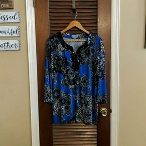 Rich blue top with a unique lace and animal print